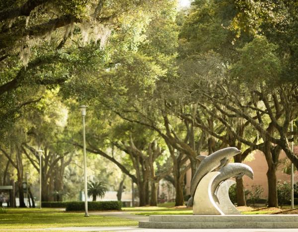 的 dolphin statues behind Howard Administration Building.